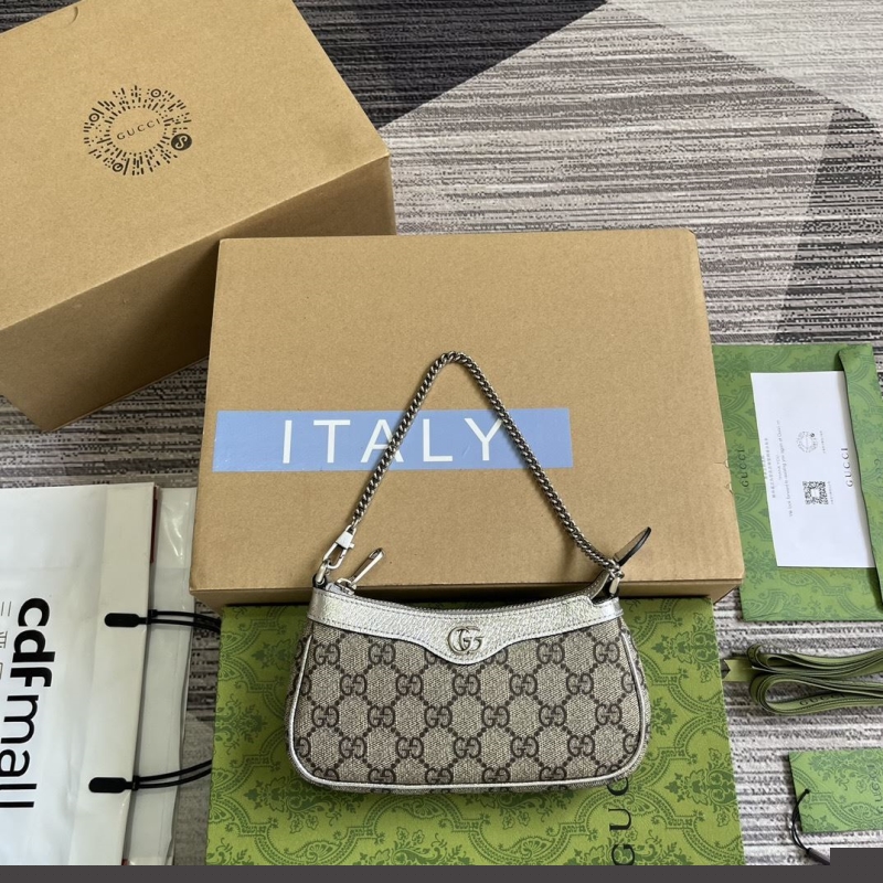 G*u*i top handle bags